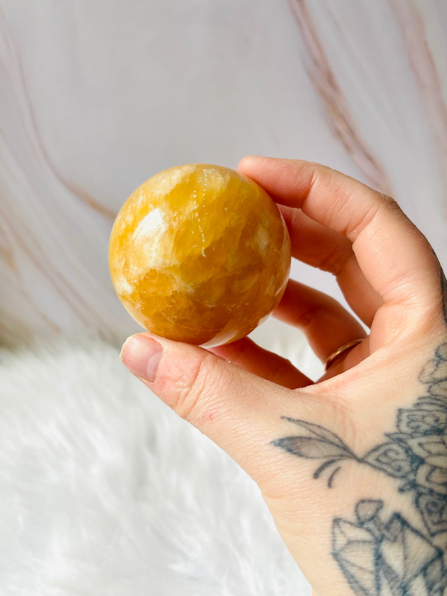 Large Orange calcite sphere