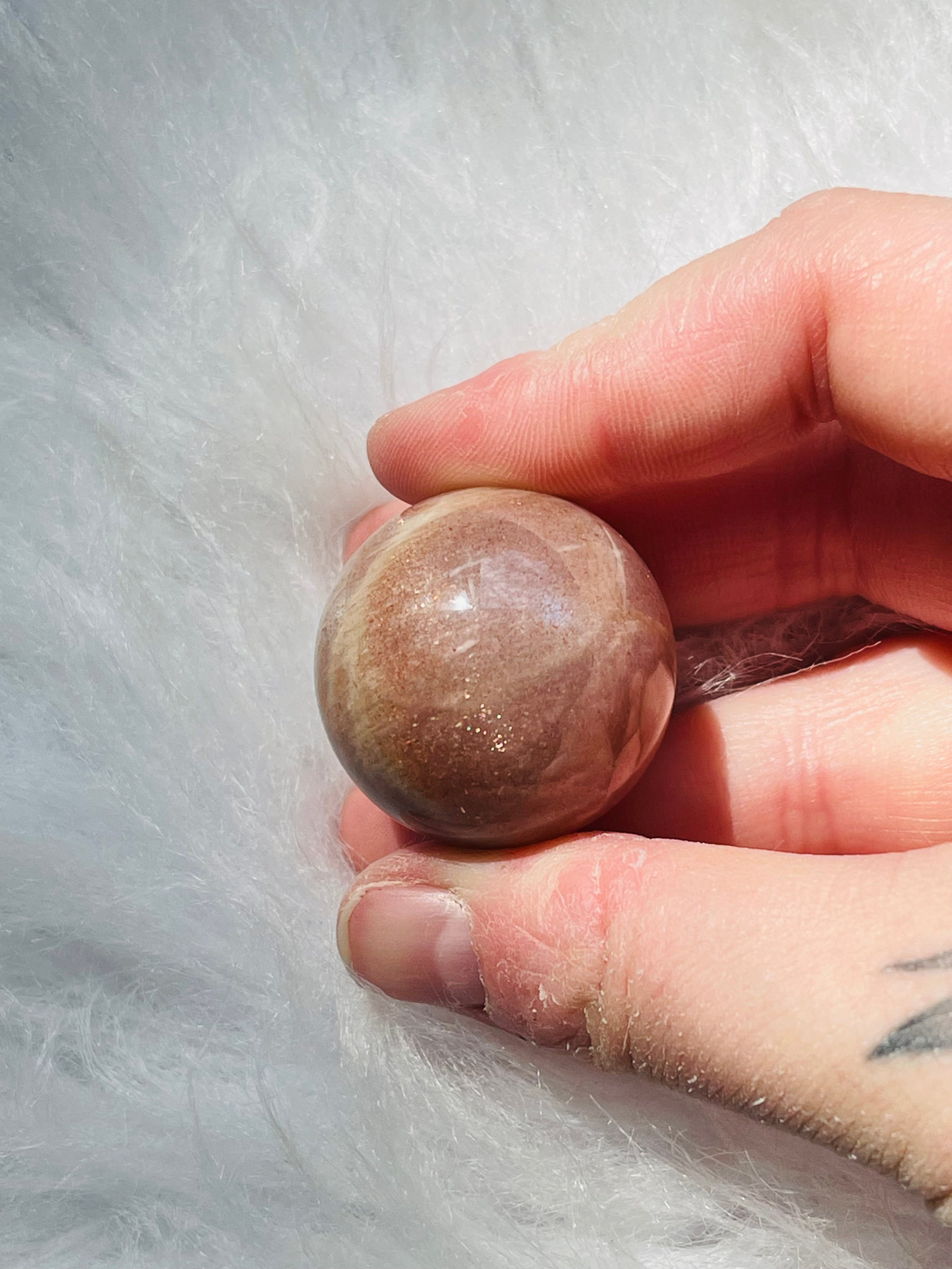 Peach Moonstone W/Sunstone Sphere