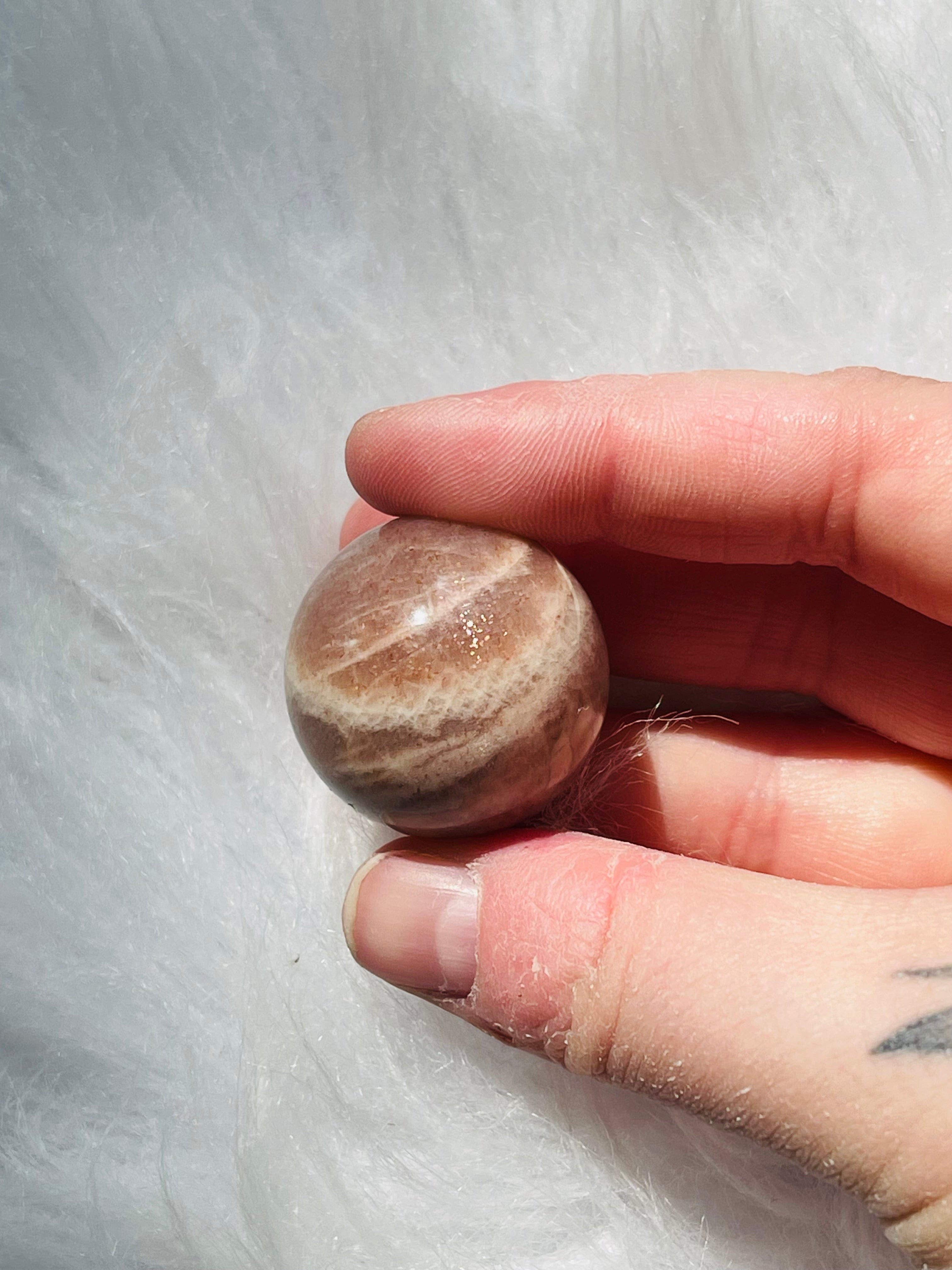 Peach Moonstone W/Sunstone Sphere