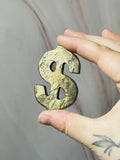 Pyrite money sign